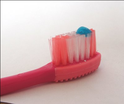 Escova de dente com mais quantidade de creme dental